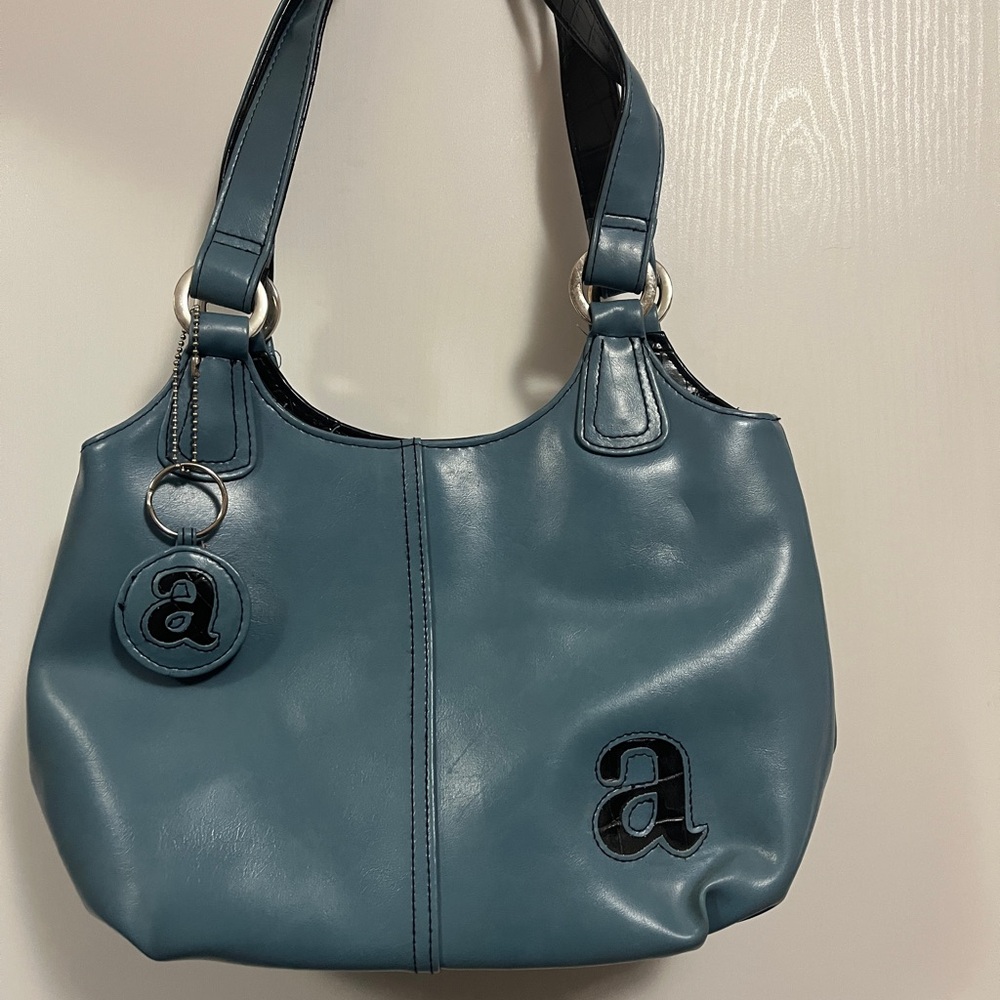 Elegant Blue Shoulder Bag with Black Accents